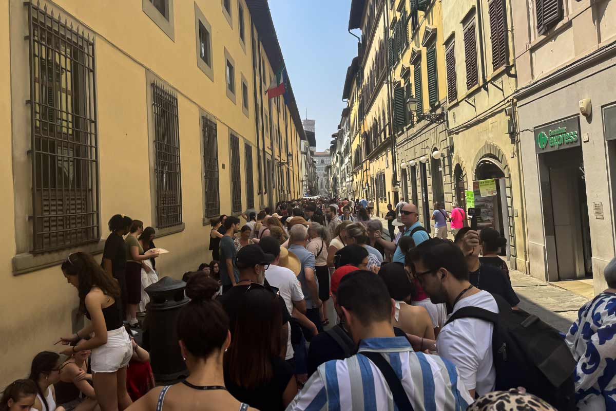 Long queue at Accademia Gallery entrance to see David statue Florence