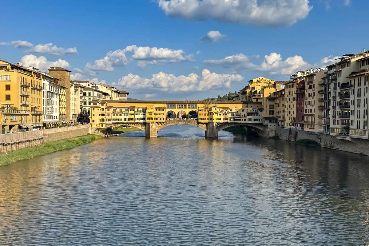 Ponte Vecchio medieval bridge panoramic view over Arno River Florence iconic landmark